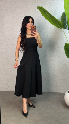 Women's Sleeveless, Square-neck, Long, Locally Made Crepe Dress With Tie Detail At The Back Of The Waist.